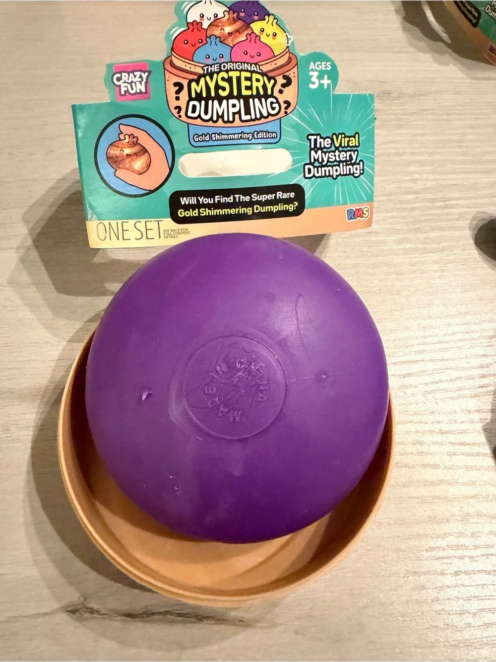 NEW Gold Shimmering Edition Mystery Squishy Dumpling - Purple